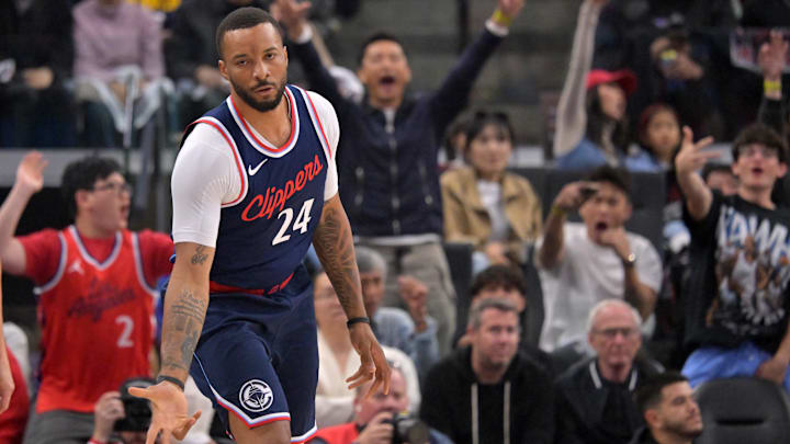 Los Angeles Clippers guard Norman Powell (24) heads down court after a 3-point basket. Los Angeles Clippers guard Norman Powell (24) heads down court after a 3-point basket.