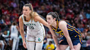 New York Liberty guard Sabrina Ionescu (20) and Indiana Fever guard Caitlin Clark (22)  in the second half at Gainbridge Fieldhouse.