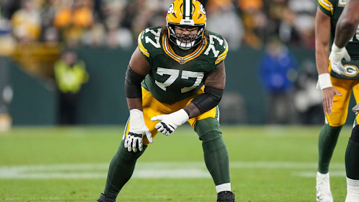 Nov 10, 2025; Green Bay, Wisconsin, USA;  Green Bay Packers offensive tackle Jordan Morgan (77) during the game against the Philadelphia Eagles at Lambeau Field. Mandatory Credit: Jeff Hanisch-Imagn Images