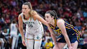 Jun 14, 2025; Indianapolis, Indiana, USA; New York Liberty guard Sabrina Ionescu (20) and Indiana Fever guard Caitlin Clark (22)  in the second half at Gainbridge Fieldhouse. Mandatory Credit: Trevor Ruszkowski-Imagn Images