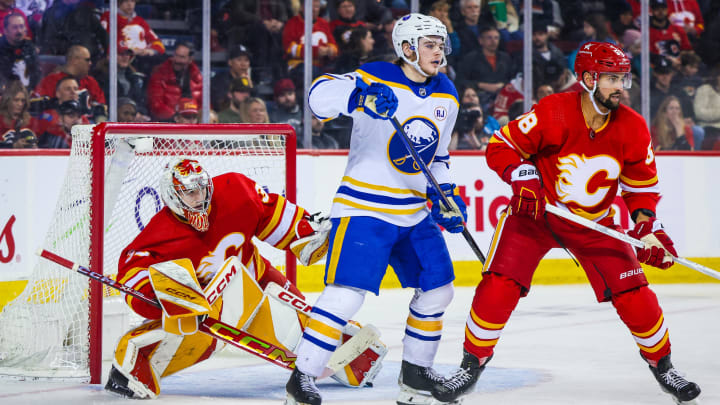 Mar 24, 2024; Calgary, Alberta, CAN; Calgary Flames goaltender Dustin Wolf (32) guards his net against the Buffalo Sabres during the third period at Scotiabank Saddledome. Mandatory Credit: Sergei Belski-USA TODAY Sports