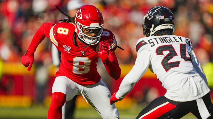Dec 21, 2024; Kansas City, Missouri, USA; Kansas City Chiefs wide receiver DeAndre Hopkins (8) runs against Houston Texans cornerback Derek Stingley Jr. (24) during the first half at GEHA Field at Arrowhead Stadium. Mandatory Credit: Jay Biggerstaff-Imagn Images