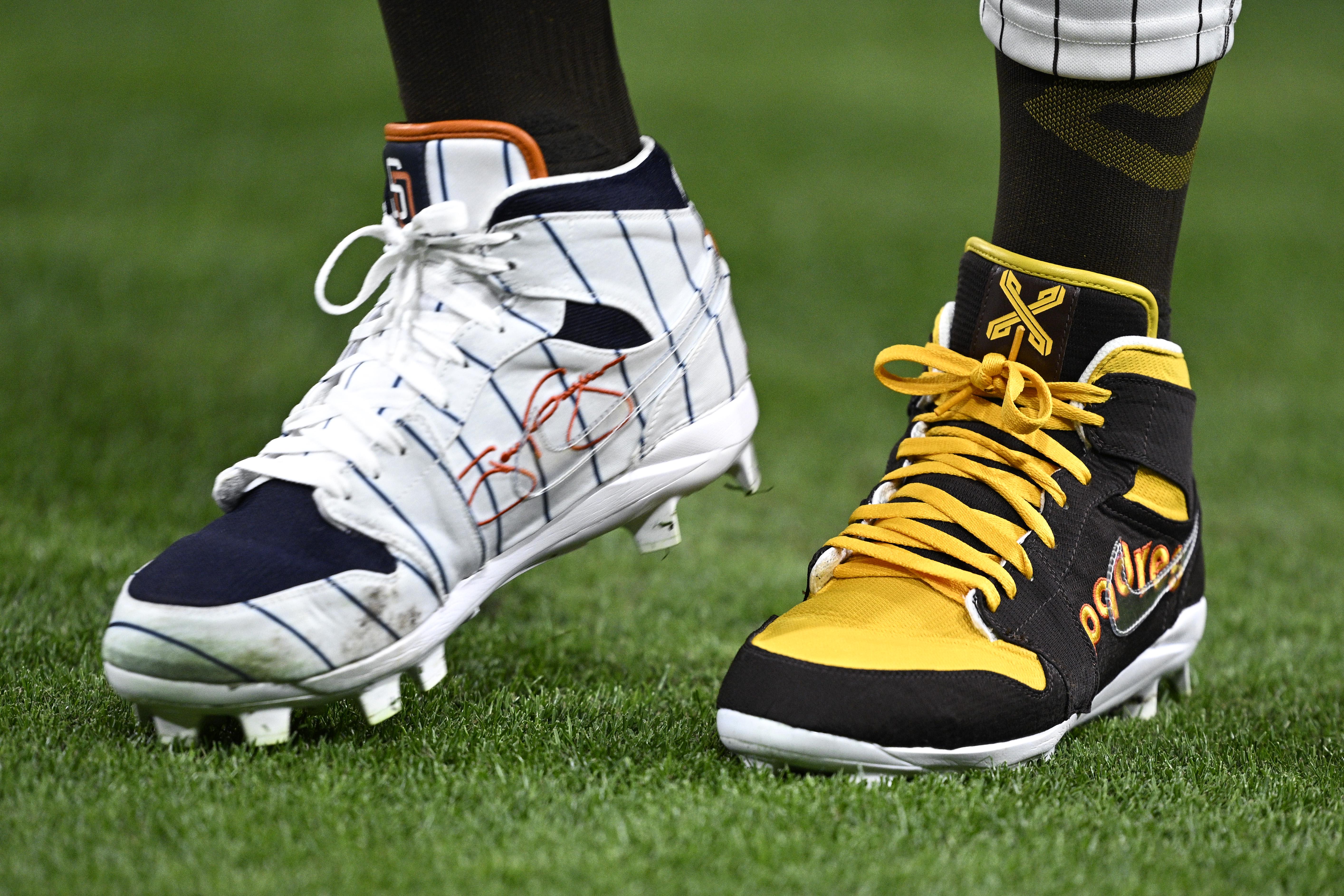 San Diego Padres outfielder Fernando Tatis Jr.'s white and brown cleats.