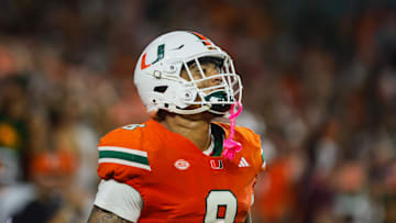 Sep 27, 2024; Miami Gardens, Florida, USA; Miami Hurricanes tight end Elijah Arroyo (8) looks on after scoring a touchdown against the Virginia Tech Hokies during the first quarter at Hard Rock Stadium. Mandatory Credit: Sam Navarro-Imagn Images