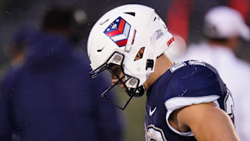 Sep 23, 2023; East Hartford, Connecticut, USA; UConn Huskies running back Victor Rosa (22) on the sideline as they take on the Duke Blue Devils in the second half at Rentschler Field at Pratt & Whitney Stadium. Mandatory Credit: David Butler II-Imagn Images