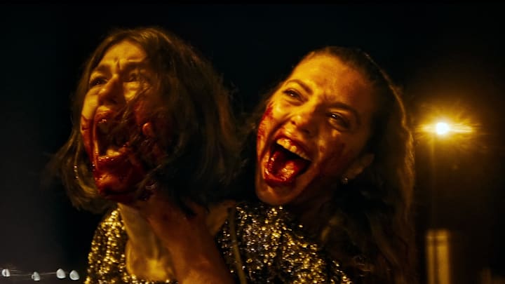 Luicielle Guillaume as “Julia” and Laurie Pavy as Anais in David Moreau’s MADS. Courtesy of Philip Lozano. A Shudder Release.