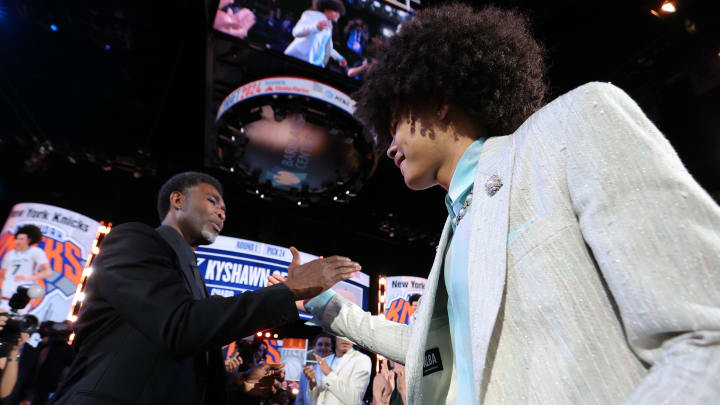 Jun 26, 2024; Brooklyn, NY, USA; Kyshawn George reacts after being selected in the first round by the New York Knicks in the 2024 NBA Draft at Barclays Center. Mandatory Credit: Brad Penner-USA TODAY Sports