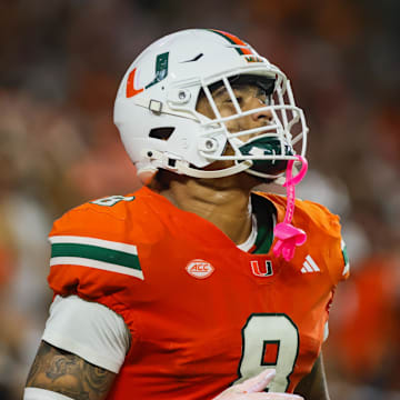 Sep 27, 2024; Miami Gardens, Florida, USA; Miami Hurricanes tight end Elijah Arroyo (8) looks on after scoring a touchdown against the Virginia Tech Hokies during the first quarter at Hard Rock Stadium. Mandatory Credit: Sam Navarro-Imagn Images