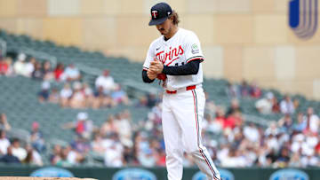 Sep 20, 2025; Minneapolis, Minnesota, USA; Minnesota Twins starting pitcher Joe Ryan (41) reacts to Cleveland Guardians third baseman Daniel Schneemann’s (10) solo home run during the fifth inning of game one of a double header at Target Field. Mandatory Credit: Matt Krohn-Imagn Images