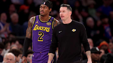 Los Angeles Lakers head coach J.J. Reddick talks to forward Jarred Vanderbilt (2) during the third quarter against the New York Knicks at Madison Square Garden.