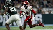 Maryland wide receiver Shaleak Knotts runs into Michigan State defensive back Dontavius Nash in second quarter.