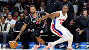 Nov 29, 2025; Miami, Florida, USA; Miami Heat guard Norman Powell (24) dribbles the ball against Detroit Pistons guard Ausar Thompson (9) during the first half at Kaseya Center. Mandatory Credit: Rhona Wise-Imagn Images