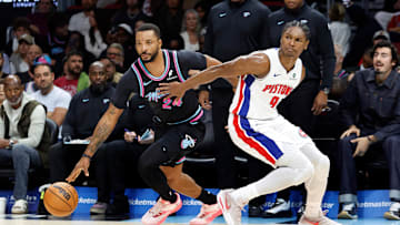 Nov 29, 2025; Miami, Florida, USA; Miami Heat guard Norman Powell (24) dribbles the ball against Detroit Pistons guard Ausar Thompson (9) during the first half at Kaseya Center. Mandatory Credit: Rhona Wise-Imagn Images