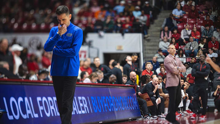 Mar 5, 2025; Tuscaloosa, Alabama, USA; Florida Gators head coach Todd Golden and Alabama Crimson Tide head coach Nate Oats direct their teams during the second half at Coleman Coliseum. Mandatory Credit: Will McLelland-Imagn Images