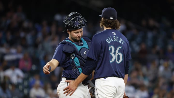 Seattle Mariners starting pitcher Logan Gilbert (36) talks with catcher Cal Raleigh (29) during the fifth inning at T-Mobile Park on Aug 27.