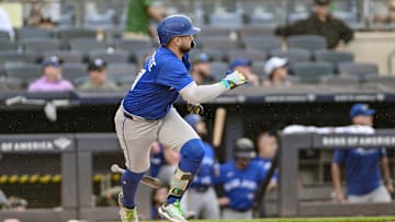 Sep 6, 2025; Bronx, New York, USA; Toronto Blue Jays shortstop Bo Bichette (11) hits a double against the New York Yankees during the fifth inning at Yankee Stadium. 
