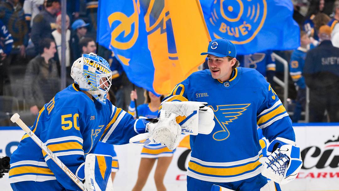 Mar 28, 2026; St. Louis, Missouri, USA; St. Louis Blues goaltender Jordan Binnington (50) is congratulated by goaltender Joel Hofer (30) after the Blues defeated the Toronto Maple Leafs at Enterprise Center. Mandatory Credit: Jeff Curry-Imagn Images