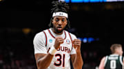 Auburn forward Chaney Johnson (31) celebrates a play against Michigan State during the first half of the Elite Eight round of NCAA tournament at State Farm Arena in Atlanta, Ga. on Sunday, March 30, 2025.
