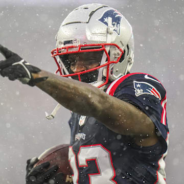 Jan 7, 2024; Foxborough, Massachusetts, USA; New England Patriots wide receiver Jalen Reagor (83) reacts after his catch against the New York Jets in the first half at Gillette Stadium. Mandatory Credit: David Butler II-Imagn Images