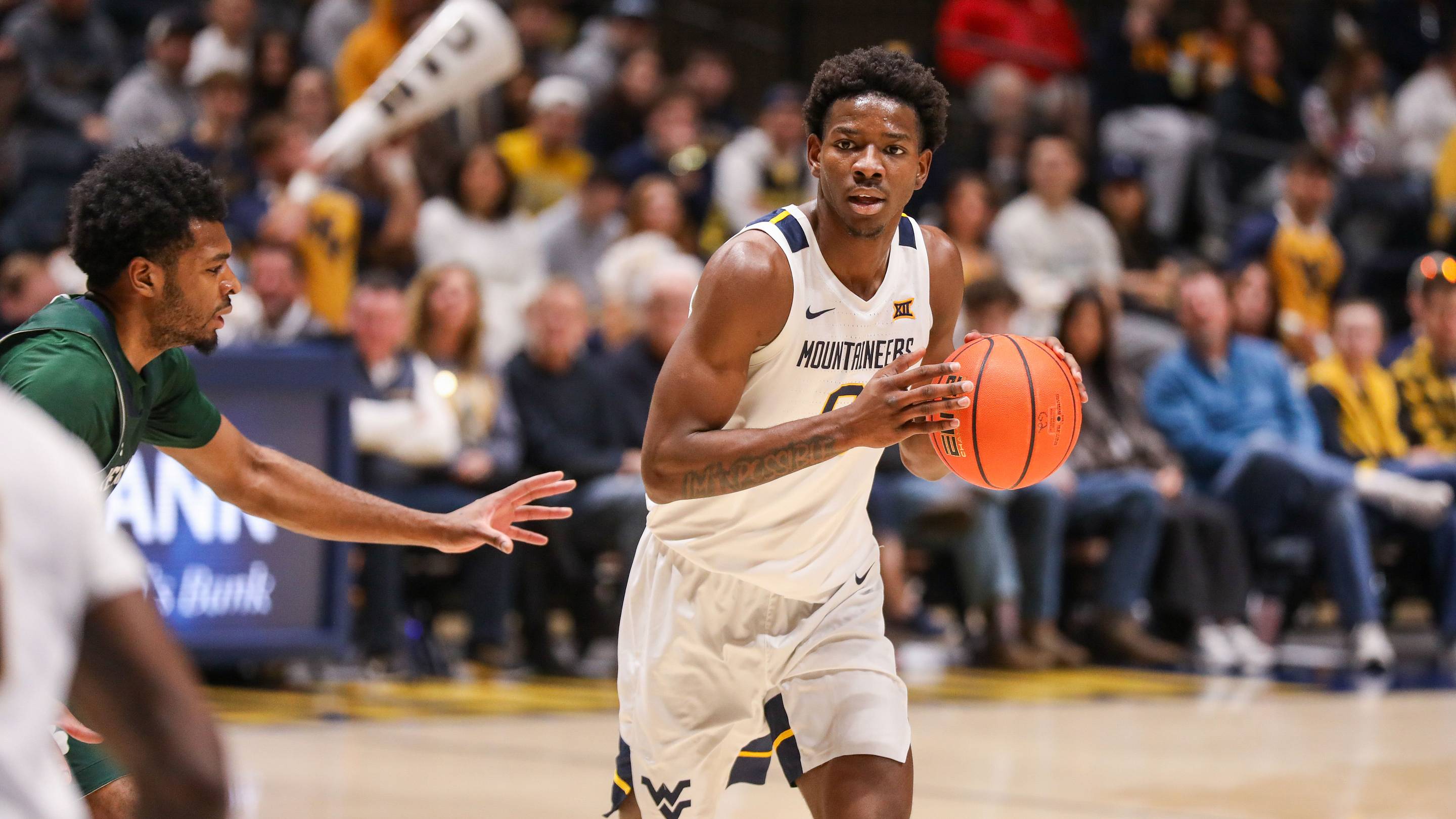 Nov 30, 2025; Morgantown, West Virginia, USA; West Virginia Mountaineers forward Brenen Lorient (0) looks to pass during the first half against the Mercyhurst Lakers at Hope Coliseum. Mandatory Credit: Ben Queen-Imagn Images | IMAGN IMAGES via Reuters Connect