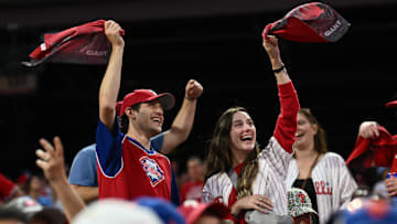 Philadelphia Phillies fans react in the ninth inning against the New York Mets during game two of the NLDS for the 2024 MLB Playoffs at Citizens Bank Park.