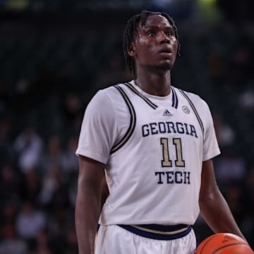 Feb 15, 2025; Atlanta, Georgia, USA; Georgia Tech Yellow Jackets forward Baye Ndongo (11) shoots a free throw against the California Golden Bears in the second half at McCamish Pavilion. Mandatory Credit: Brett Davis-Imagn Images