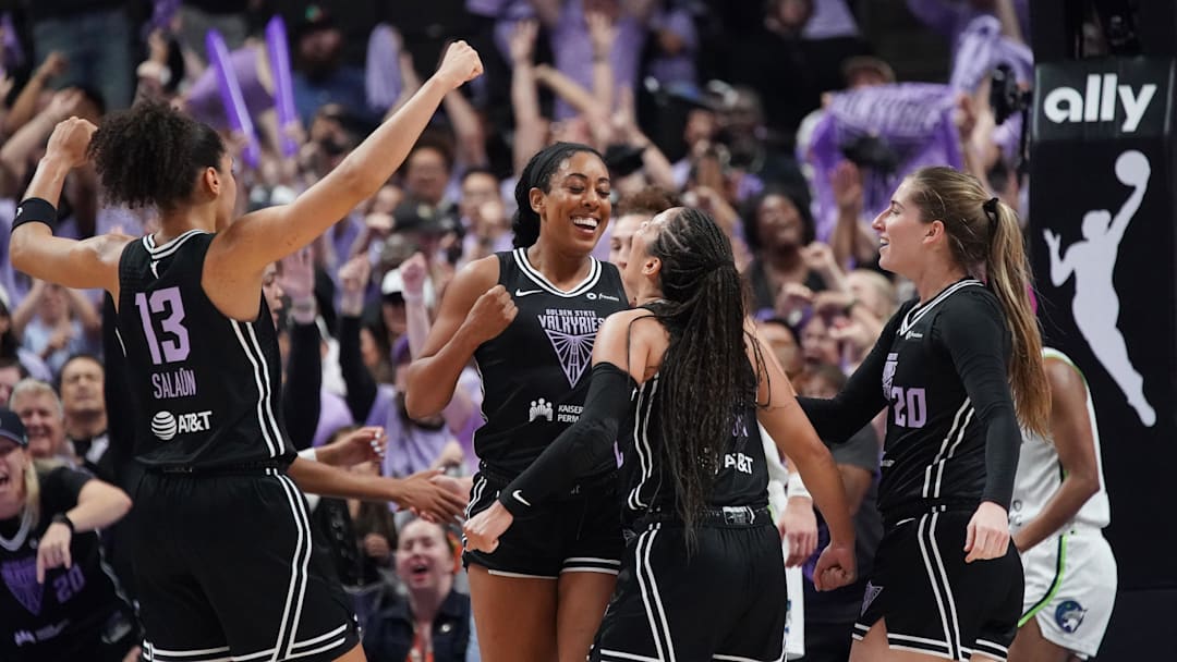 Golden State Valkyries forward Monique Billings (25) celebrates a basket in the fourth quarter with guard Veronica Burton (22), forward Janelle Salaun (13), and guard Kate Martin (20) in the fourth quarter in game two of round one for the 2025 WNBA Playoffs at SAP Center. 