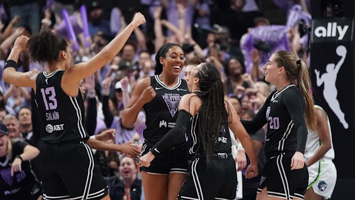 Golden State Valkyries forward Monique Billings (25) celebrates a basket in the fourth quarter with guard Veronica Burton (22), forward Janelle Salaun (13), and guard Kate Martin (20) in the fourth quarter in game two of round one for the 2025 WNBA Playoffs at SAP Center. 