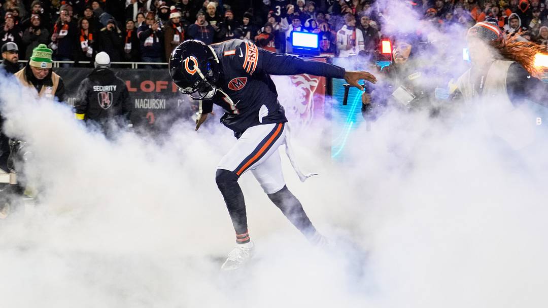 Dec 20, 2025; Chicago, Illinois, USA; Chicago Bears cornerback Jaylon Johnson (1) runs onto the field during player introductions before the game against the Green Bay Packers at Soldier Field. Mandatory Credit: David Banks-Imagn Images