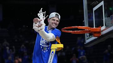 Mar 29, 2025; San Francisco, CA, USA; Florida Gators head coach Todd Golden celebrates after cutting the net down following the Florida Gators win over the Texas Tech Red Raiders during the West Regional final of the 2025 NCAA tournament at Chase Center. Mandatory Credit: Kyle Terada-Imagn Images