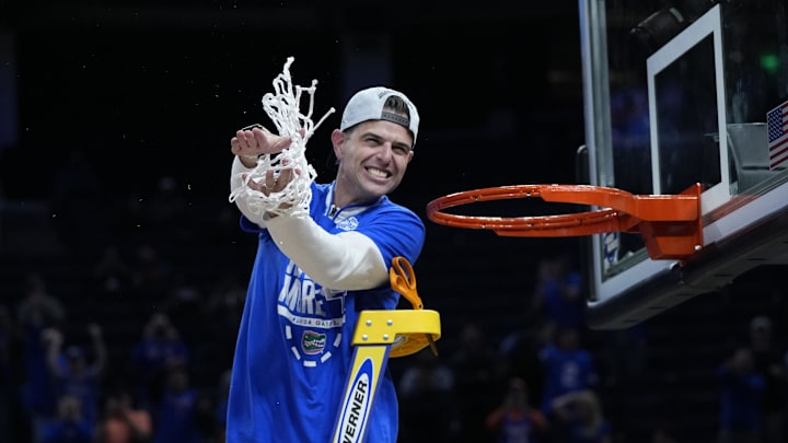 Mar 29, 2025; San Francisco, CA, USA; Florida Gators head coach Todd Golden celebrates after cutting the net down following the Florida Gators win over the Texas Tech Red Raiders during the West Regional final of the 2025 NCAA tournament at Chase Center. Mandatory Credit: Kyle Terada-Imagn Images