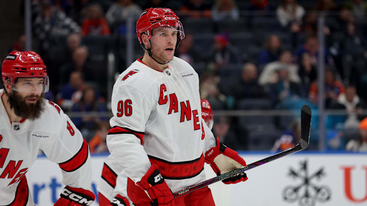 Jan 25, 2025; Elmont, New York, USA; Carolina Hurricanes right wing Mikko Rantanen (96) skates against the New York Islanders during the first period at UBS Arena. Mandatory Credit: Brad Penner-Imagn Images