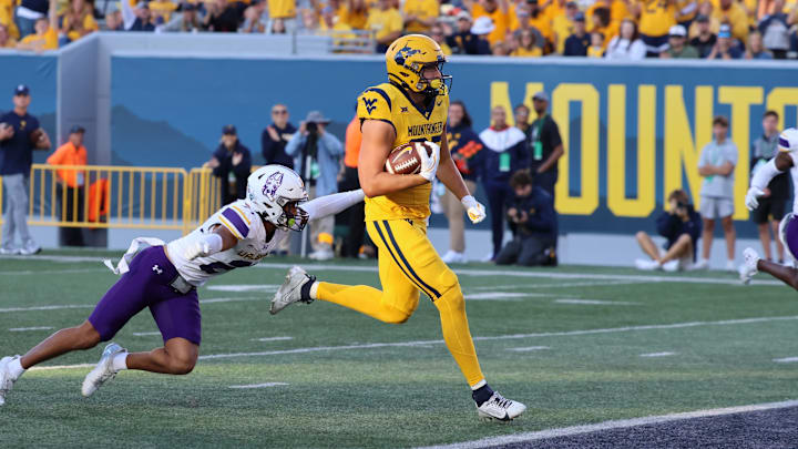 West Virgnia University tight end Kole Taylor crosses the goal line for a 39-yard touchdown reception in the second quarter against Albany. 