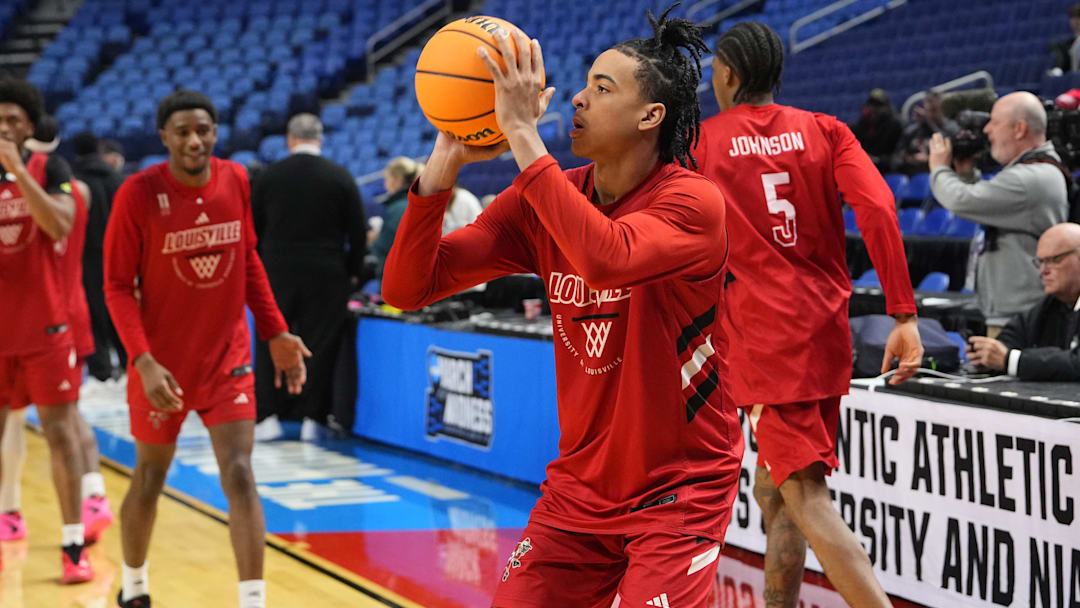 Mar 18, 2026; Buffalo, NY, USA; Louisville Cardinals Guard Mikel Brown Jr. (0) shoots the ball during a practice session ahead of the first round of the men's 2026 NCAA Tournament at Keybank Center. Mandatory Credit: Gregory Fisher-Imagn Images