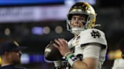Notre Dame quarterback Riley Leonard can control the game through the air and on the ground.