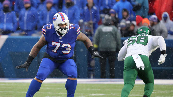 Bills Dion Dawkins drops back to pass block against Jets Carl Lawson.