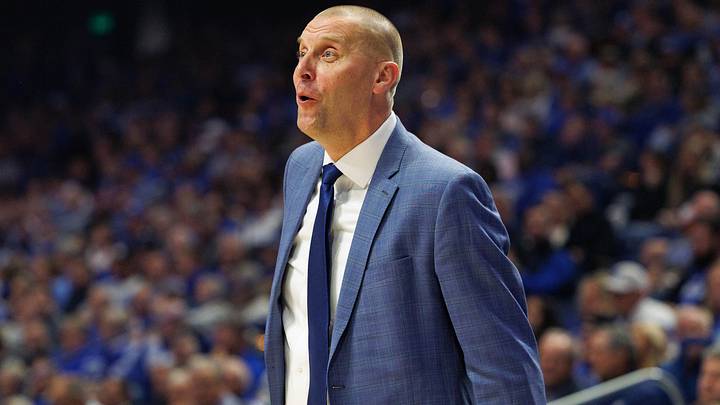 Nov 19, 2024; Lexington, Kentucky, USA; Kentucky Wildcats head coach Mark Pope celebrates from the sideline during the first half against the Lipscomb Bisons at Rupp Arena at Central Bank Center. Mandatory Credit: Jordan Prather-Imagn Images