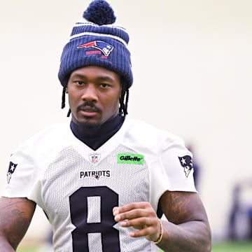 Jun 10, 2025; Foxborough, MA, USA; New England Patriots wide receiver Stefon Diggs (8) walks to the podium to speak to the media after minicamp held in the WIN Field House at Gillette Stadium. Mandatory Credit: Eric Canha-Imagn Images