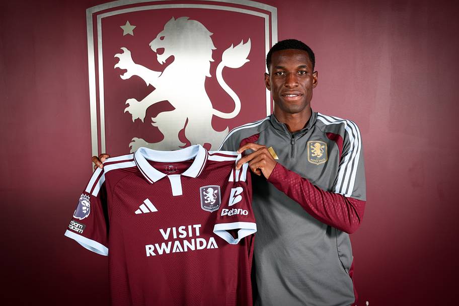 Nicolas Jackson posing with Aston Villa kit.