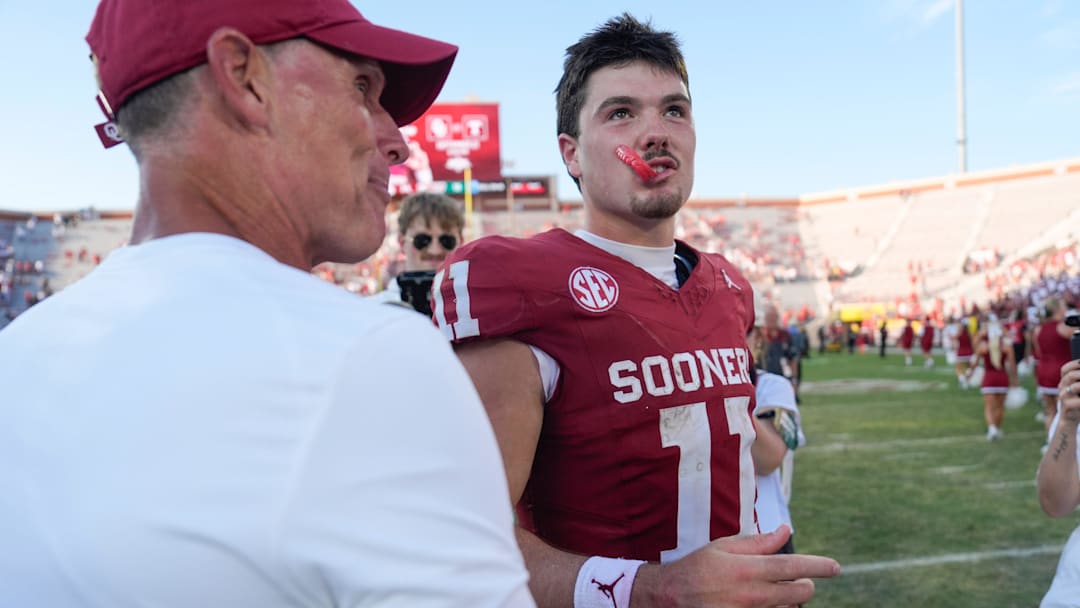 Oklahoma Sooners quarterback Jackson Arnold (11) talks with coach Brent Venables after a college football game between the University of Oklahoma Sooners (OU) and the Tulane Green Wave at Gaylord Family - Oklahoma Memorial Stadium in Norman, Okla., Saturday, Sept. 14, 2024.