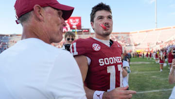 Oklahoma Sooners quarterback Jackson Arnold (11) talks with coach Brent Venables after a college football game between the University of Oklahoma Sooners (OU) and the Tulane Green Wave at Gaylord Family - Oklahoma Memorial Stadium in Norman, Okla., Saturday, Sept. 14, 2024.