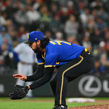 Seattle Mariners relief pitcher Andres Munoz (75) fields a ground ball against the Texas Rangers during the ninth inning at T-Mobile Park on Sept 14.