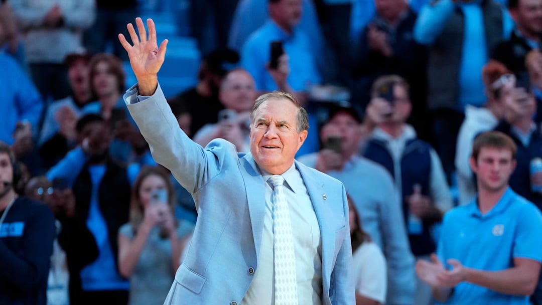 Dec 14, 2024; Chapel Hill, North Carolina, USA; North Carolina Tar Heels head football coach Bill Belichick is introduced during half time at Dean E. Smith Center. Mandatory Credit: Bob Donnan-Imagn Images
