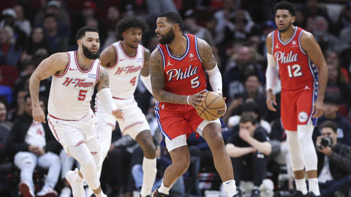 Dec 29, 2023; Houston, Texas, USA; Philadelphia 76ers forward Marcus Morris Sr. (5) controls the ball during the second quarter against the Houston Rockets at Toyota Center. Mandatory Credit: Troy Taormina-USA TODAY Sports