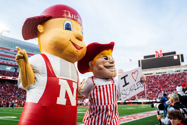 Lil’ Red and Herbie Husker pose during the third quarter between the Nebraska Cornhuskers and the Wisconsin Badgers.