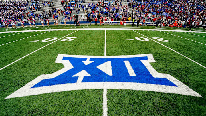 Oct 23, 2021; Lawrence, Kansas, USA; A general view of the Big 12 Conference logo on the field after the game between the Kansas Jayhawks and the Oklahoma Sooners at David Booth Kansas Memorial Stadium. Mandatory Credit: Jay Biggerstaff-Imagn Images