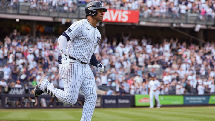 Aug 11, 2024; Bronx, New York, USA; New York Yankees right fielder Juan Soto (22) rounds the bases during his solo home run during the seventh inning against the Texas Rangers at Yankee Stadium.