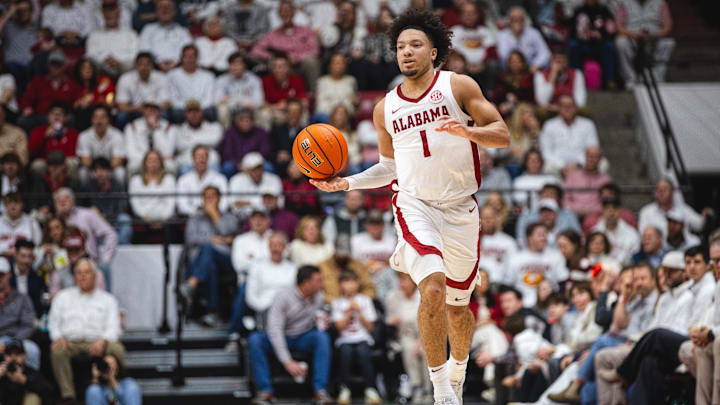 Feb 22, 2025; Tuscaloosa, Alabama, USA; Alabama Crimson Tide guard Mark Sears (1) drives the ball against the Kentucky Wildcats during the first half at Coleman Coliseum. Mandatory Credit: Will McLelland-Imagn Images