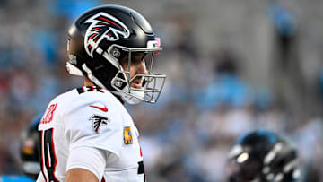 Oct 13, 2024; Charlotte, North Carolina, USA;  Atlanta Falcons quarterback Kirk Cousins (18) reacts after a play in the second quarter at Bank of America Stadium. Mandatory Credit: Bob Donnan-Imagn Images