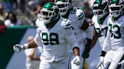 Aug 10, 2024; East Rutherford, New Jersey, USA; New York Jets defensive tackle Bruce Hector (98) celebrates after a sack during the first quarter against the Washington Commanders at MetLife Stadium. 
